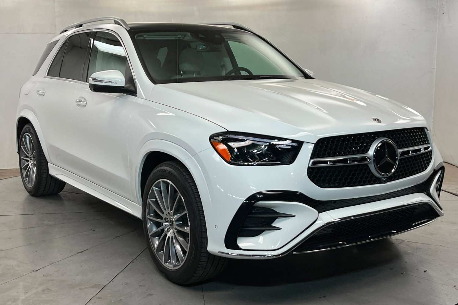 2026 Mercedes-Benz GLE SUV in white shown from the cross view