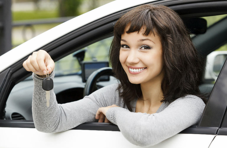 woman holding keys